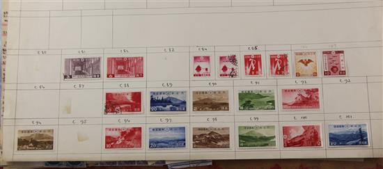 An album of Chinese stamps and two albums of World stamps,